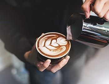 Barista making a latte