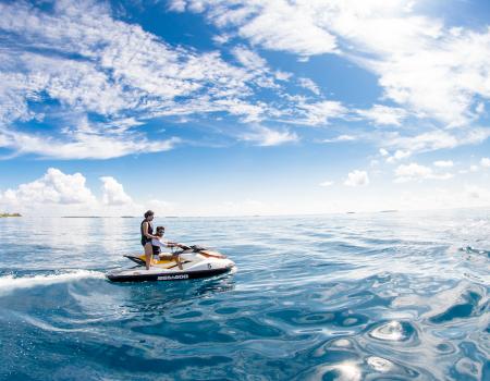 People on a jet ski in the water