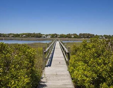 Pier and path to the water from a sound front vacation rental