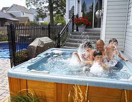 Family in a hot tub at a vacation rental home