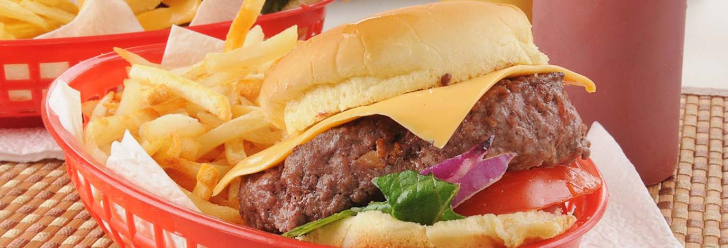 Burger and french fry basket from a bar