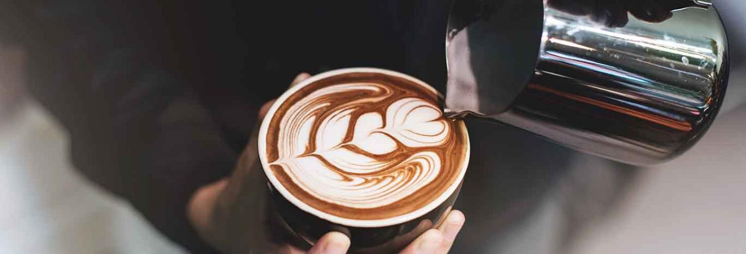 Barista making latte art