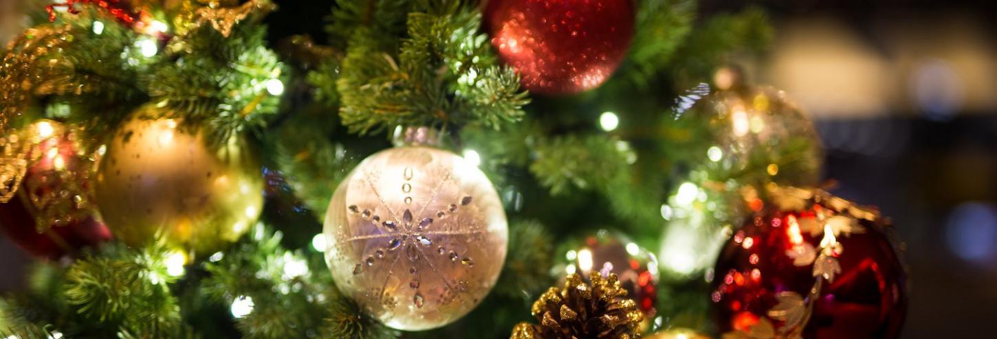 Christmas Ornaments On A Tree - The Christmas House