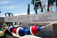 A sign that says Southport, NC