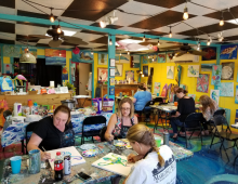 Margaret Rudd employees enjoying an art class together