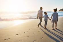 family walking on beach