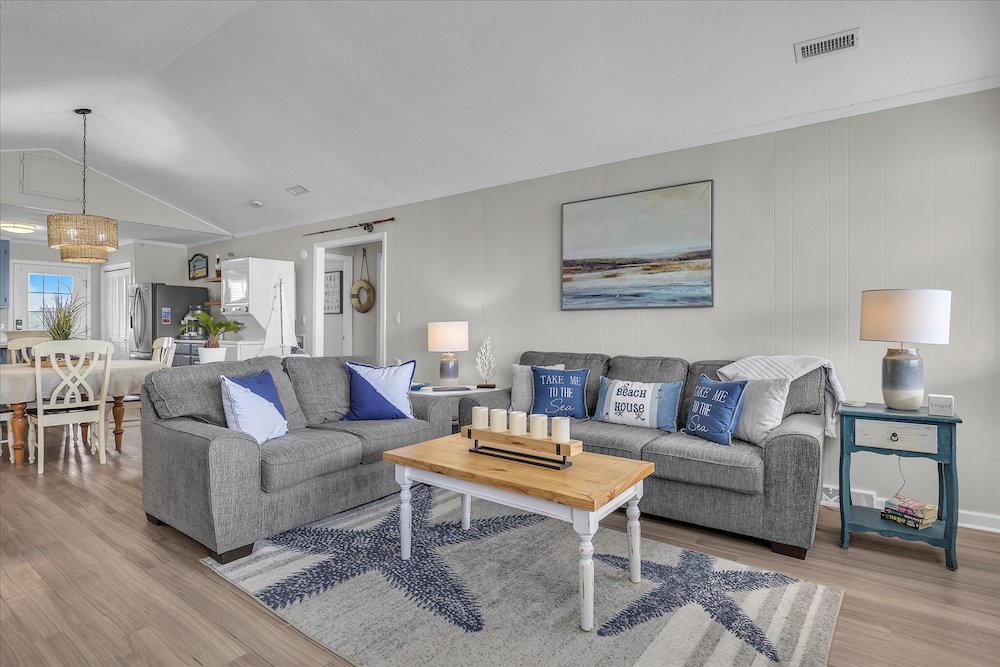 living room of after dune delight vacation rental in oak island