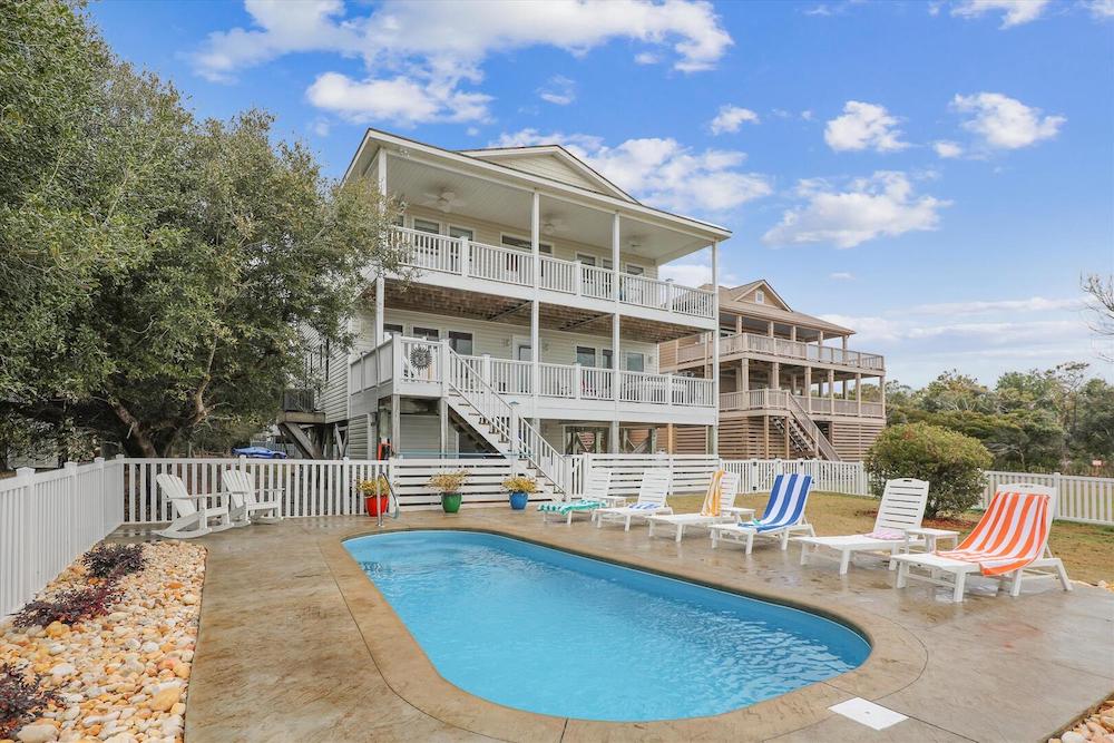 house with in-ground pool