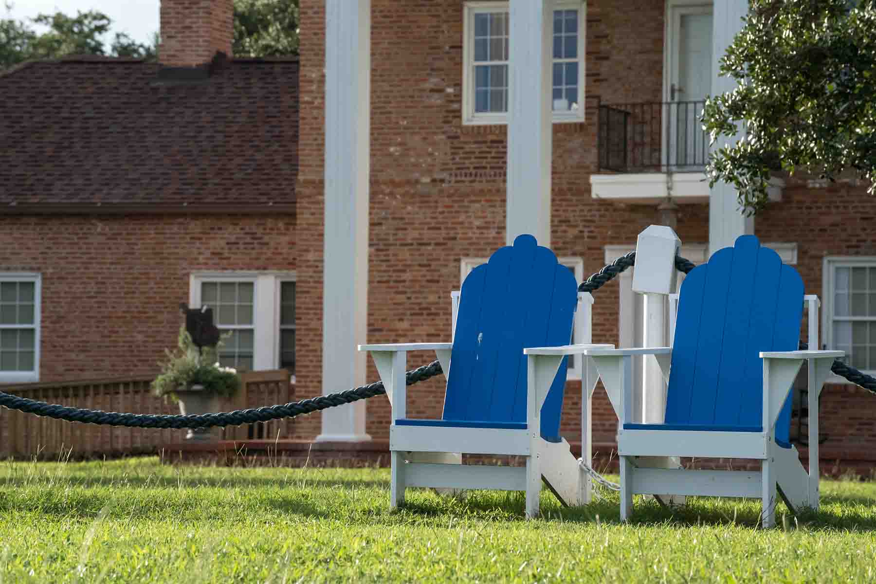 Lounge chairs in front of a historic Southport building